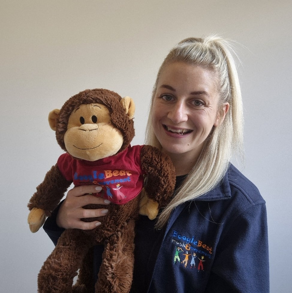 kerrie basingstoke owner, holding Giggles the Monkey