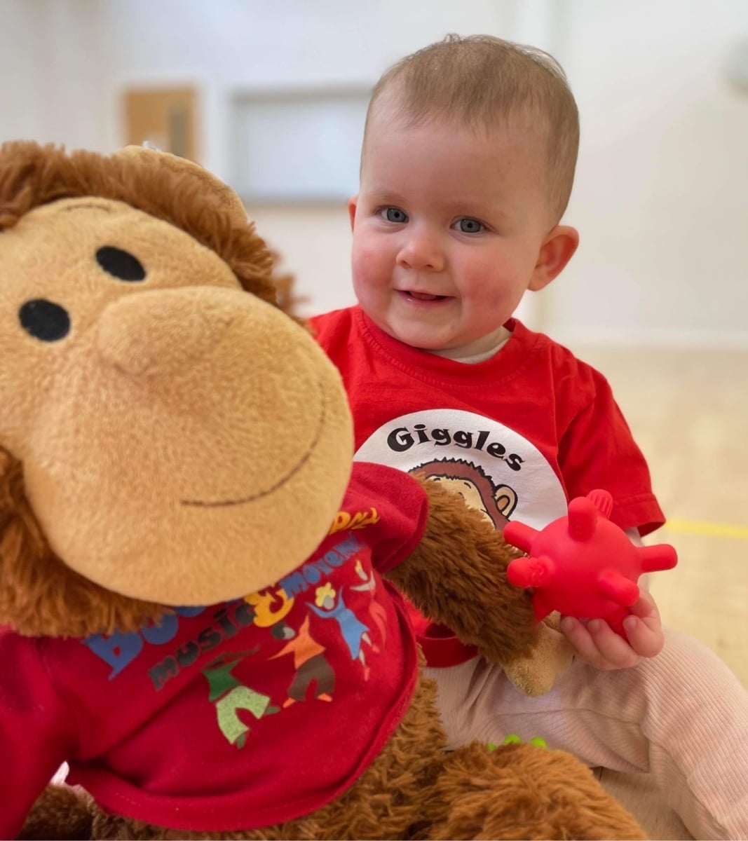 Baby with tshirt and monkey