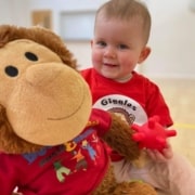 Baby with tshirt and monkey