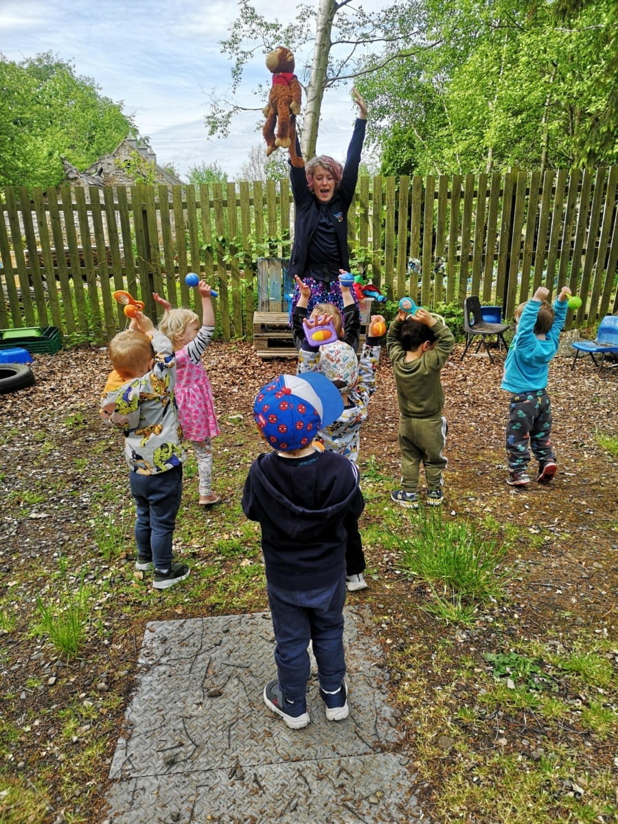 Mairi from boogie beat edinburgh with children from a preschool in an activity