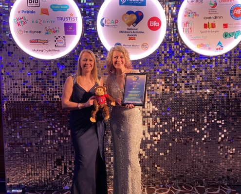 Hannah and Mairi attending the National childrens awards in sparkly dresses