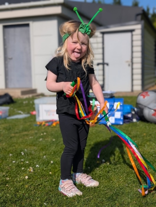 Girl dressed as a bug for our fundraiser