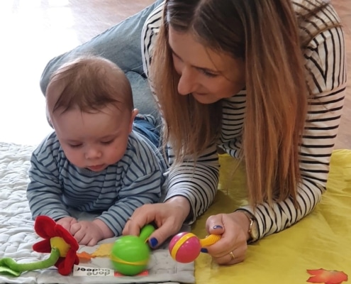 Mother and child taking part in a boogie beat class