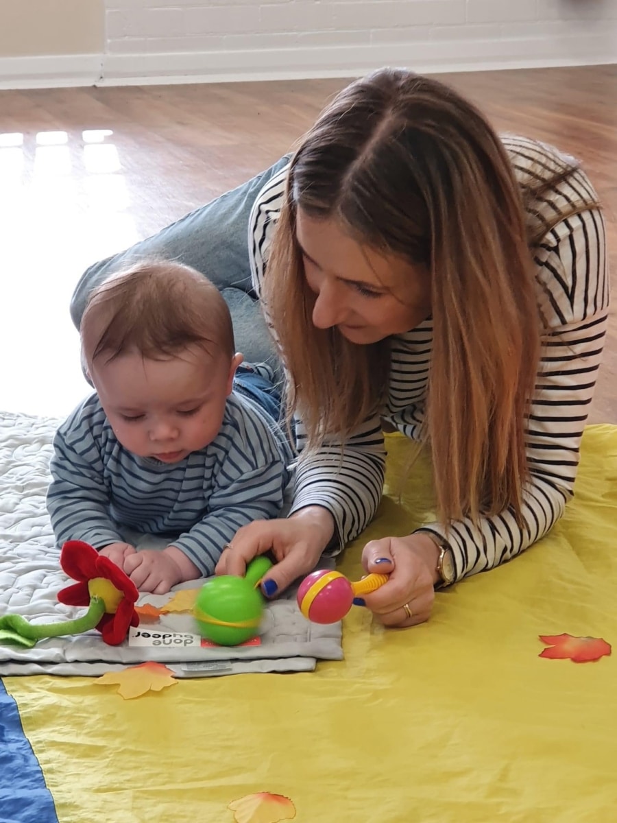 Mother and child taking part in a boogie beat class